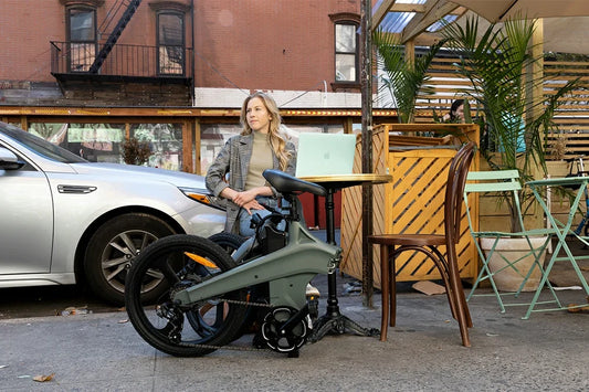 DYU T1 folded e-bike showing compact storage size