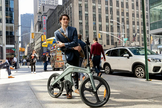 DYU T1 magnesium alloy frame e-bike riding on city street